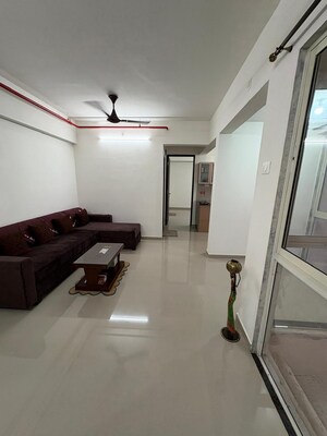 Living Room in 2 BHK Apartment at Lodha Luxuria, Majiwada – for Rent