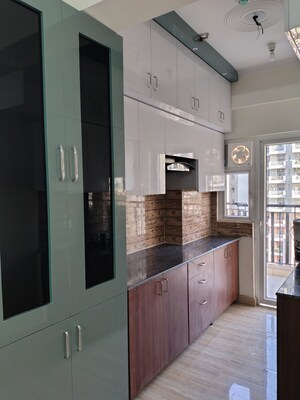 Kitchen in 3 BHK Apartment at Amrapali Tropical Garden, Tech Zone 4 Greater Noida – for Rent