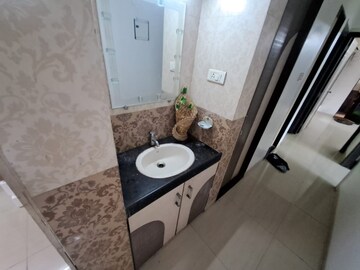 Bathroom in 2 BHK Apartment at Neptune Living Point, Bhandup West – for Rent