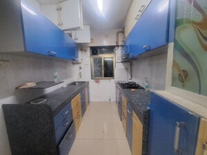 Kitchen in 2 BHK Apartment at Neptune Living Point, Bhandup West – for Rent