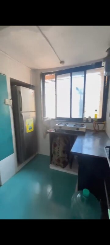 Kitchen in 1 BHK Apartment at Oakland Park, Andheri West – for Sale