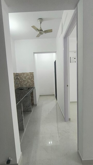 Kitchen in 2 BHK Apartment at Puranik Rumah Bali, Ghodbunder Road – for Rent