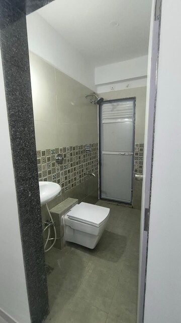 Bathroom in 2 BHK Apartment at Puranik Rumah Bali, Ghodbunder Road – for Rent