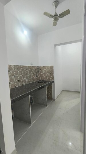 Kitchen in 2 BHK Apartment at Puranik Rumah Bali, Ghodbunder Road – for Rent