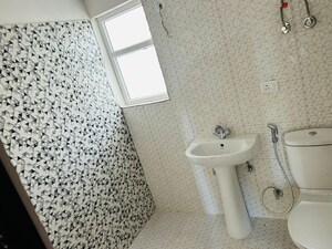 Bathroom in 4 BHK Apartment at Fusion Homes, Tech Zone 4 Greater Noida – for Sale