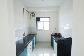 Kitchen in 1 BHK Apartment at Ram Pushpanjali Residency, Owale – for Rent
