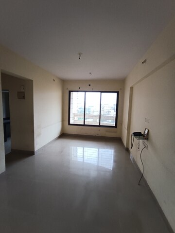 Living Room in 1 BHK Apartment at Ajmera Yogi Dham Phase III, Kalyan West – for Sale