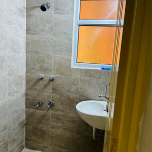 Bathroom in 1 BHK Apartment at Wave Prime Floors, Ram Nagar – for Rent