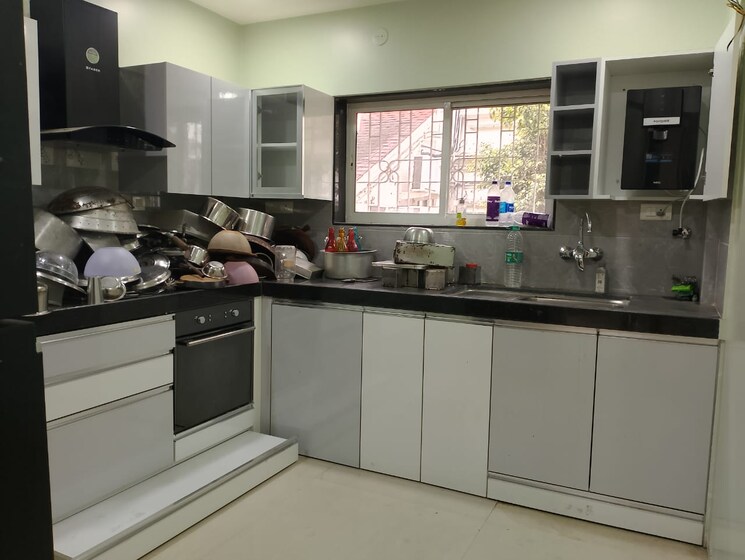 Kitchen, vasant-vihar-row-house-iii 5 Bedroom 6000 Sq.Ft. Apartment In Baner Pune 9236109