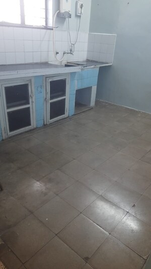 Kitchen in 2 BHK Apartment at Shri Senapati Bapat CHS, Senapati Bapat Road – for Rent