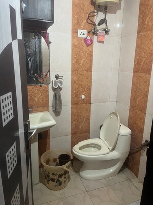 Bathroom in 3 BHK Apartment at Kanha Apartments Indirapuram, Shakti Khand 2 – for Sale