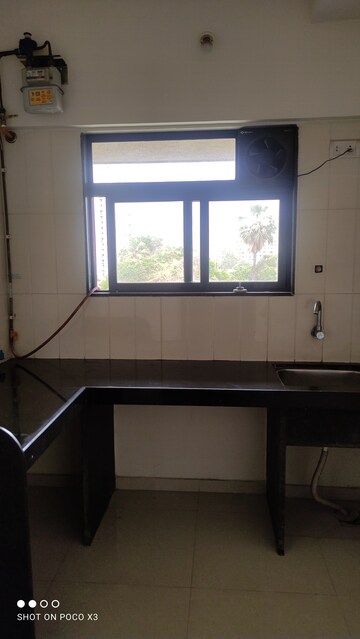 Kitchen in 1 BHK Apartment at Puraniks Tokyo Bay, Kasarvadavali – for Rent