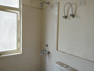 Bathroom in 2 BHK Apartment at Conscient Habitat 78, Sector 78 – for Sale