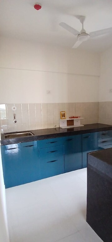 Kitchen in 2 BHK Apartment at Shapoorji Pallonji Joyville Celestia, Hadapsar – for Rent