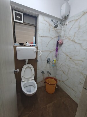 Bathroom in 2 BHK Apartment at Rutu Estate, Brahmand – for Rent