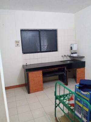 Kitchen in 1 BHK Apartment at Gananjay Society, Kothrud – for Rent