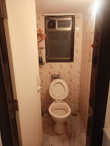 Bathroom in 3 BHK Apartment at Brindavan CHS, Andheri East – for Rent