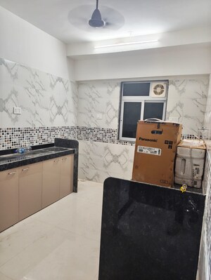 Kitchen in 2 BHK Apartment at DGS Sheetal Anupam, Malad West – for Sale