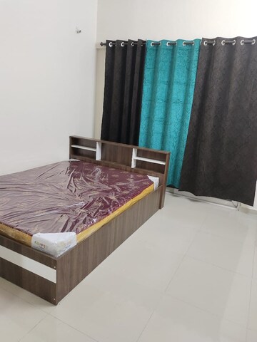 Bedroom in 2 BHK Apartment at Megapolis Sangria Towers, Hinjewadi – for Rent
