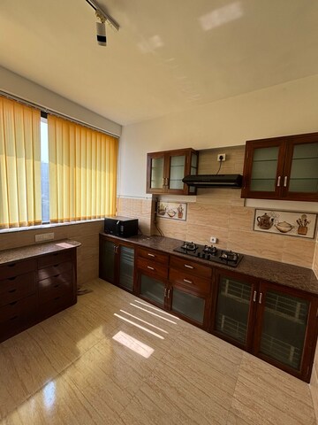 Kitchen in 3 BHK Apartment at Hiranandani Gardens Lake Castle, Powai – for Sale