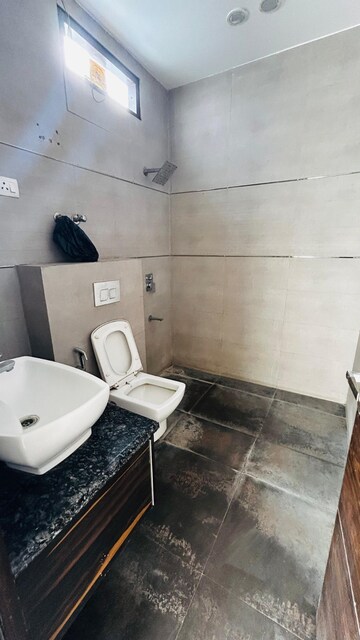 Bathroom in 4 BHK Builder Floor at DLF Atria, Dlf Phase ii – for Rent