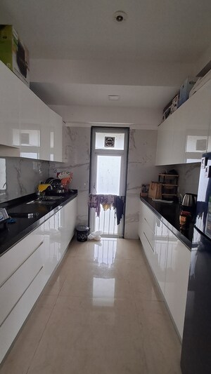 Kitchen in 2 BHK Apartment at Ruparel Ariana, Parel – for Rent