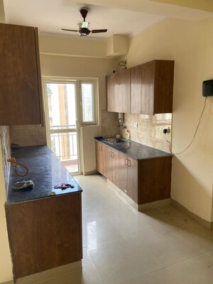 Kitchen in 3 BHK Apartment at Amrapali Crystal Homes, Sector 76 – for Sale