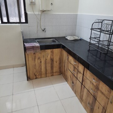 Kitchen in 2 BHK Apartment at Eden Park, Viman Nagar – for Rent