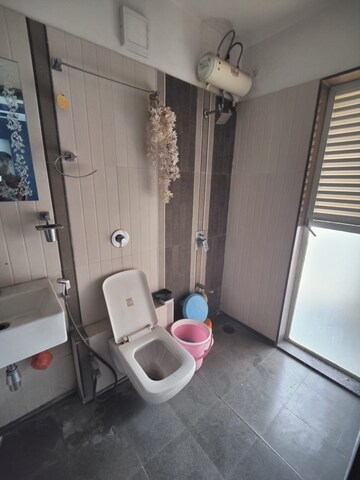 Bathroom in 1 BHK Apartment at Hiranandani Estate Rodas Enclave, Ghodbunder Road – for Rent