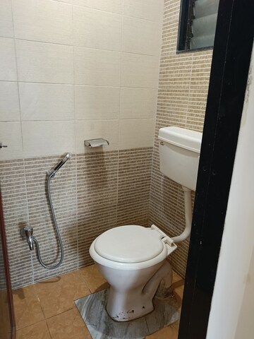 Attached Bathroom in 1 BHK Apartment at Parel Lokseva CHS, Worli – for Rent