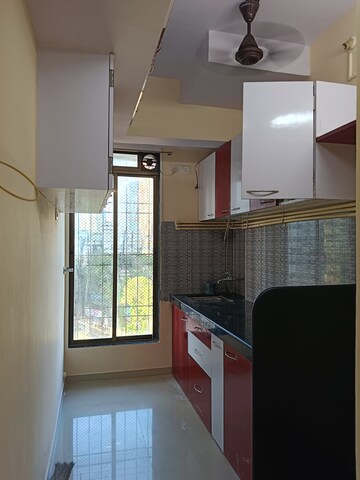 Kitchen in 1 BHK Apartment at Parel Lokseva CHS, Worli – for Rent