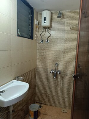 Bathroom in 1 BHK Apartment at Parel Lokseva CHS, Worli – for Rent