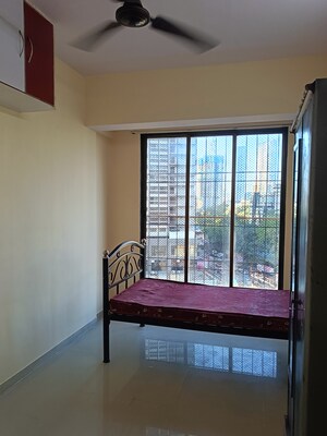 Bedroom in 1 BHK Apartment at Parel Lokseva CHS, Worli – for Rent