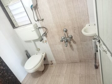 Bathroom in 2 BHK Apartment at Unique Garden, Mira Road East – for Rent