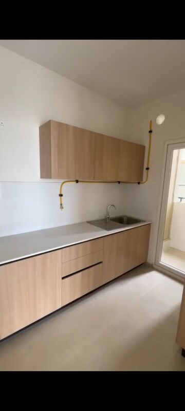 Kitchen in 2 BHK Apartment at Bhartiya City Nikoo Homes 4, Thanisandra Main Road – for Sale
