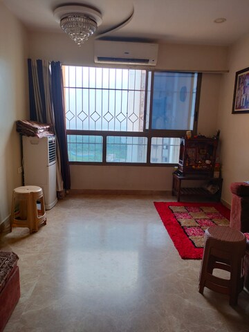 Living Room in 2 BHK Apartment at Lodha Luxuria, Majiwada – for Sale