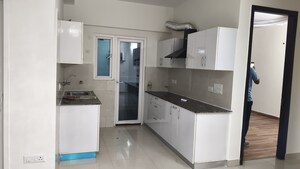Kitchen in 2.5 BHK Apartment at Samridhi Luxuriya Avenue, Sector 150 – for Rent