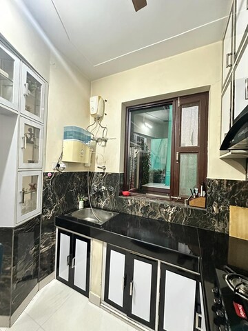 Kitchen in 6+ BHK Builder Floor at Sheetla Colony – for Sale