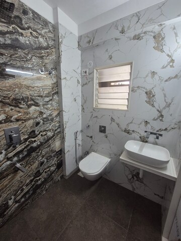 Bathroom in 1 BHK Apartment at Om Fair Township, Dhansar – for Sale