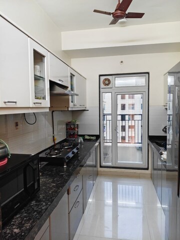 Kitchen in 2 BHK Apartment at Rustomjee Azziano Wing E, Thane West – for Rent