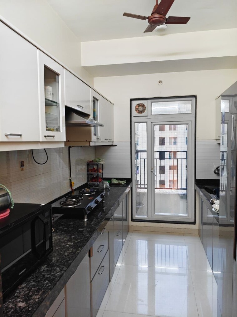 Kitchen, rustomjee-azziano-wing-e 2 Bedroom 720 Sq.Ft. Apartment In Thane West Thane 9238111
