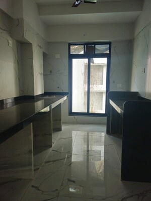 Kitchen in 3 BHK Apartment at Gautam Prabhu CHS, Borivali West – for Sale