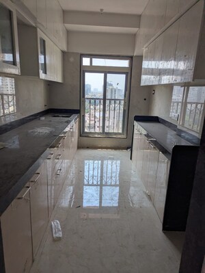 Kitchen in 3 BHK Apartment at Gautam Prabhu CHS, Borivali West – for Sale