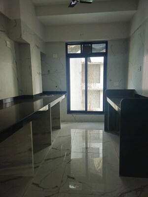 Kitchen in 3 BHK Apartment at Gautam Prabhu CHS, Borivali West – for Sale