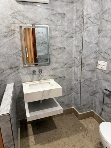 Bathroom in 3 BHK Apartment at Boutique Residential Apartments C-253, Defence Colony – for Rent