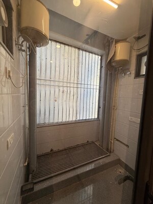 Bathroom in 3 BHK Apartment at Boutique Residential Apartments C-253, Defence Colony – for Rent