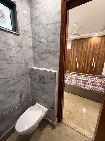 Bathroom in 3 BHK Apartment at Boutique Residential Apartments C-253, Defence Colony – for Rent