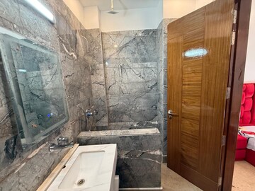 Bathroom in 3 BHK Apartment at Boutique Residential Apartments C-253, Defence Colony – for Rent