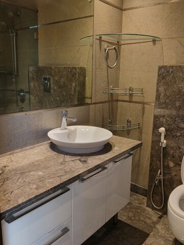 Bathroom in 4 BHK Apartment at Panchsheel Park – for Rent