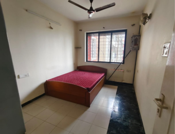 Bedroom in 2 BHK Apartment at Sheth Vasant Galaxy, Laxmi Nagar – for Rent